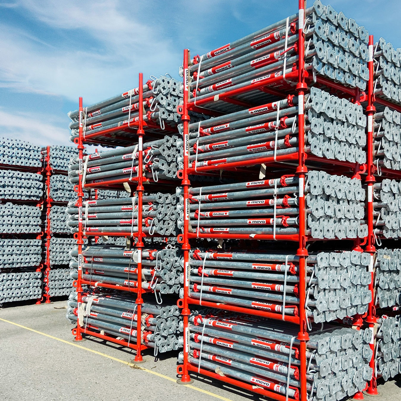 Piles of props stacked in racks in a yard