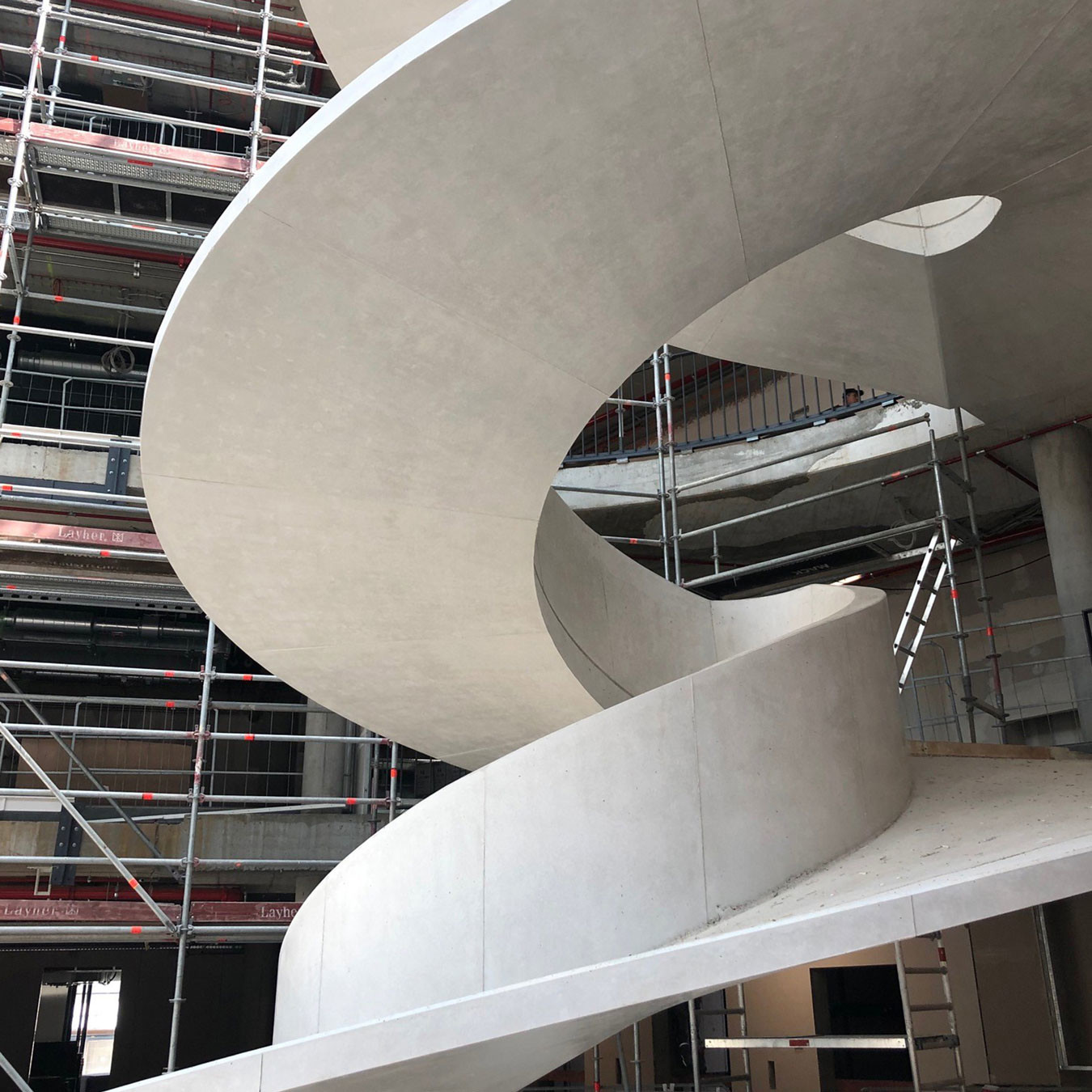 Elegant spiral stairs design in concrete