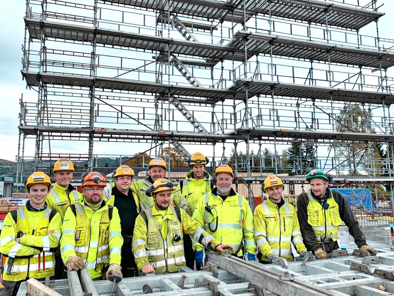 workers prepare formwork at a care centre in Norway