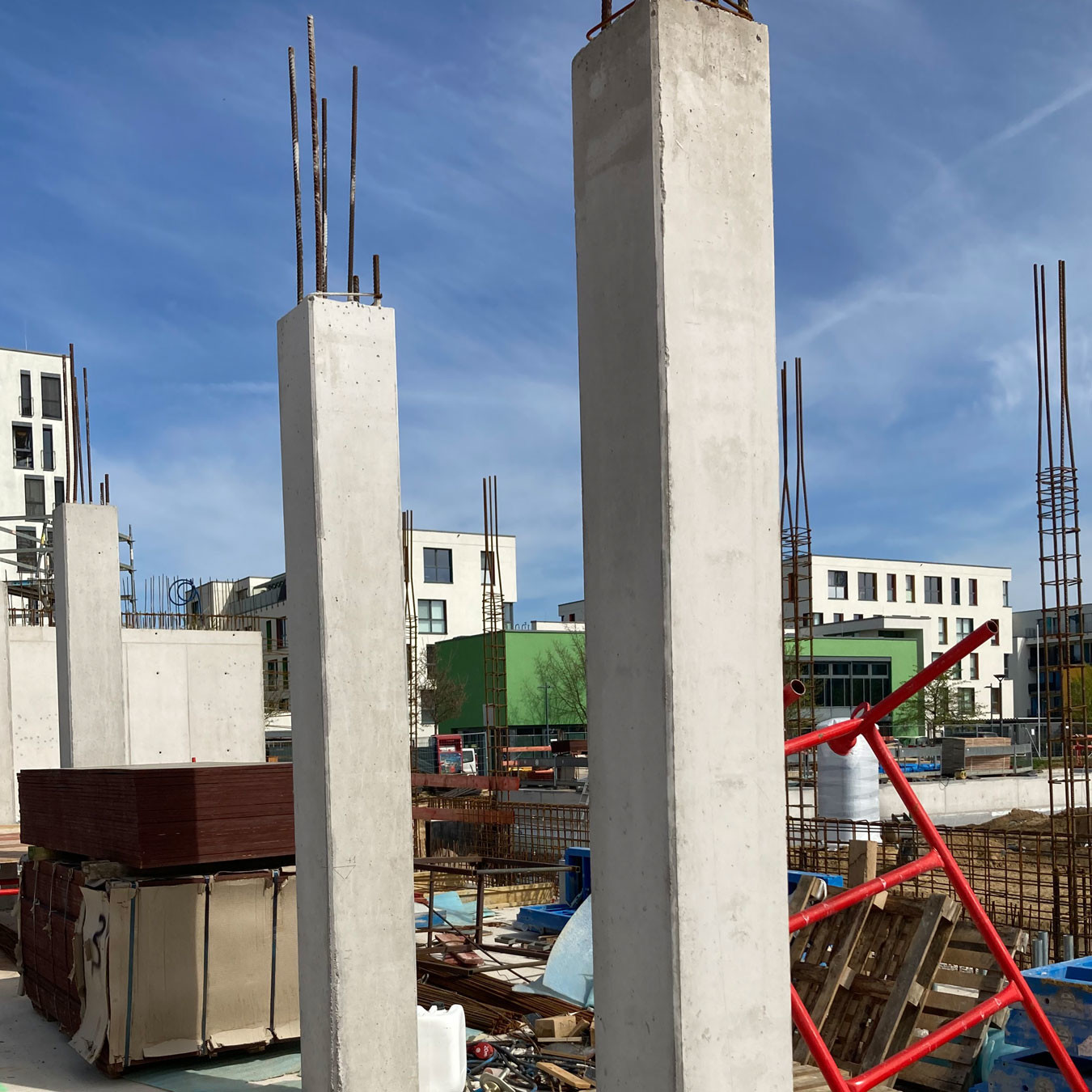 Two concrete columns part way through construction