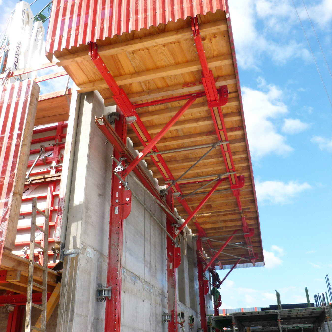 Protective screens for rail guided formwork