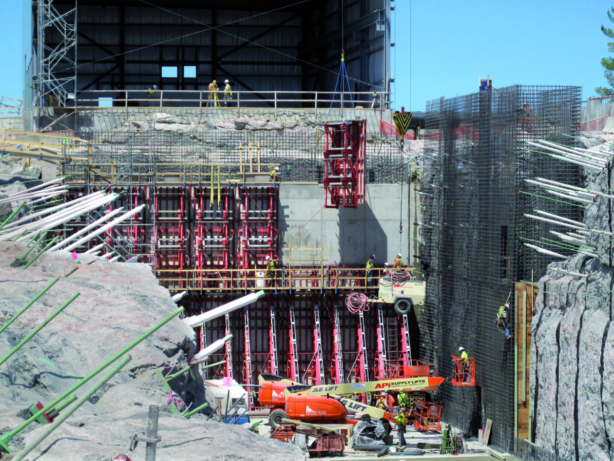 Image showing climbing formwork being used to construct concrete scientific plant in USA